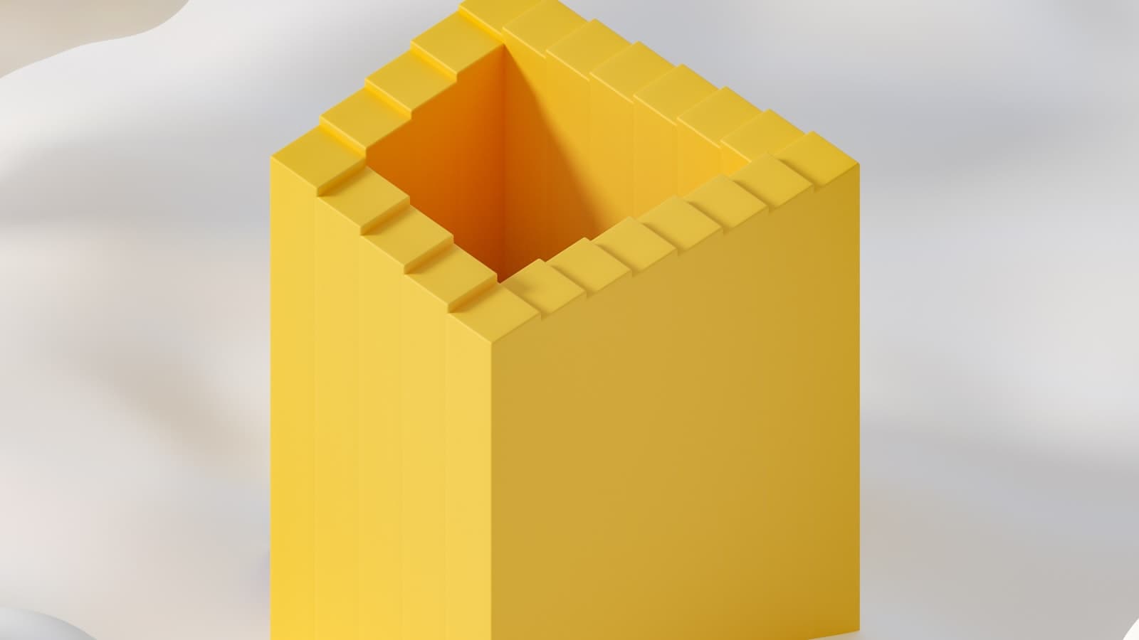 A block of butter in paper on a wooden kitchen counter