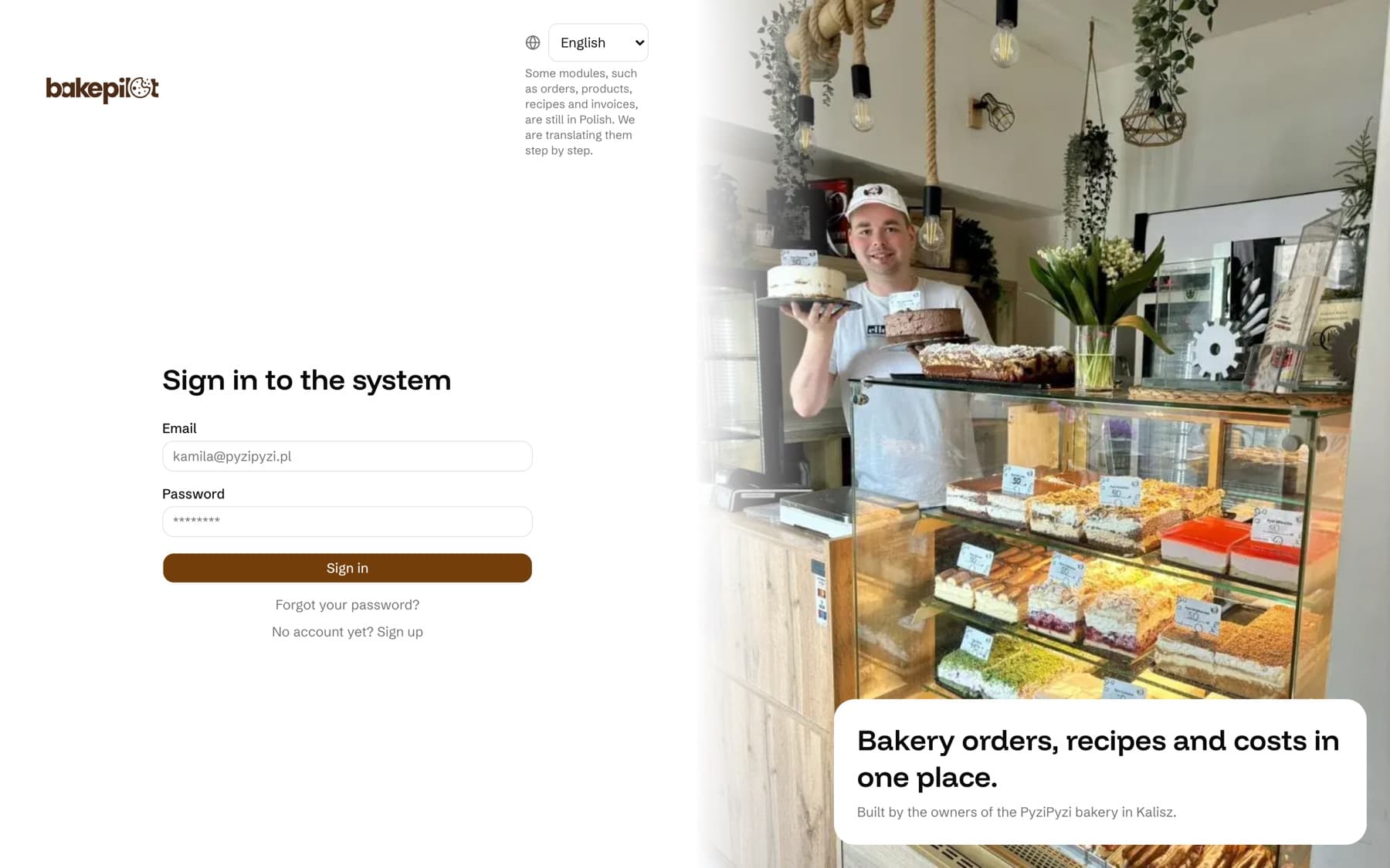 BakePilot login screen with Email and Password fields, the Sign in button, the Forgot your password? and No account yet? Sign up links, and the language picker in the top right corner