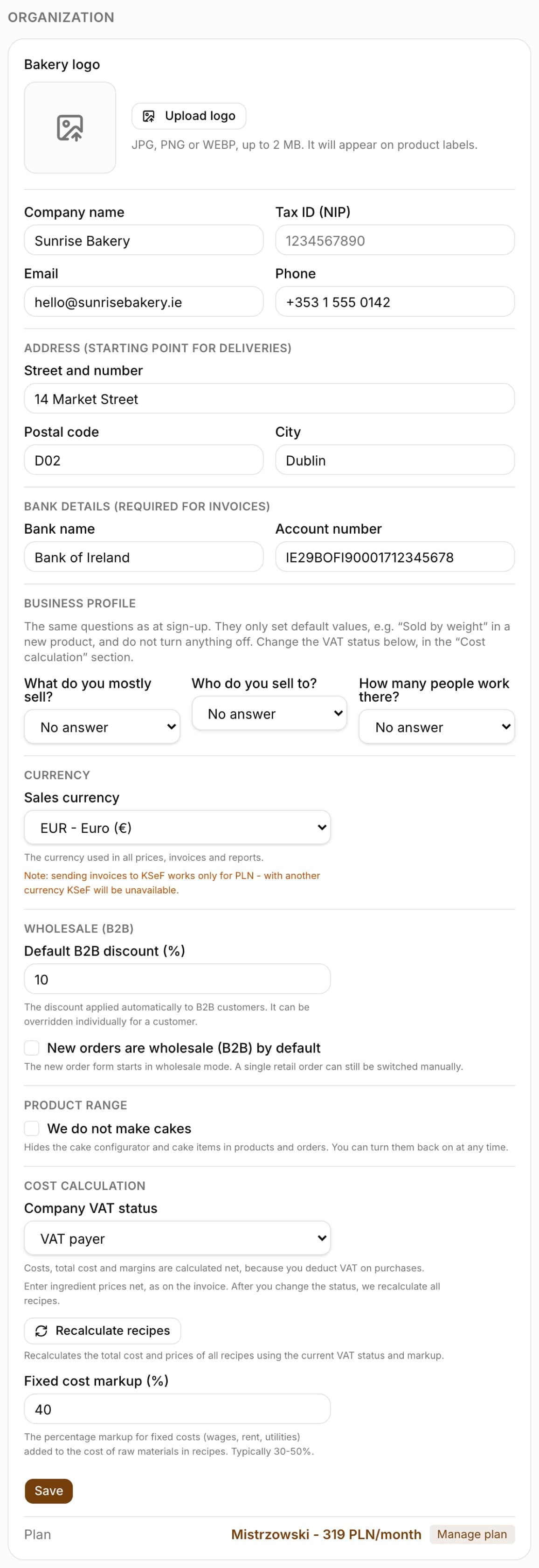 The Organization section in Settings: Bakery logo with the Upload logo button and the note JPG, PNG or WEBP, up to 2 MB, company name, NIP, email and phone, the groups Address (starting point for deliveries), Bank details, Currency, Wholesale (B2B), Business profile and Cost calculation with the Company VAT status field, the Recalculate recipes button and the fixed cost markup