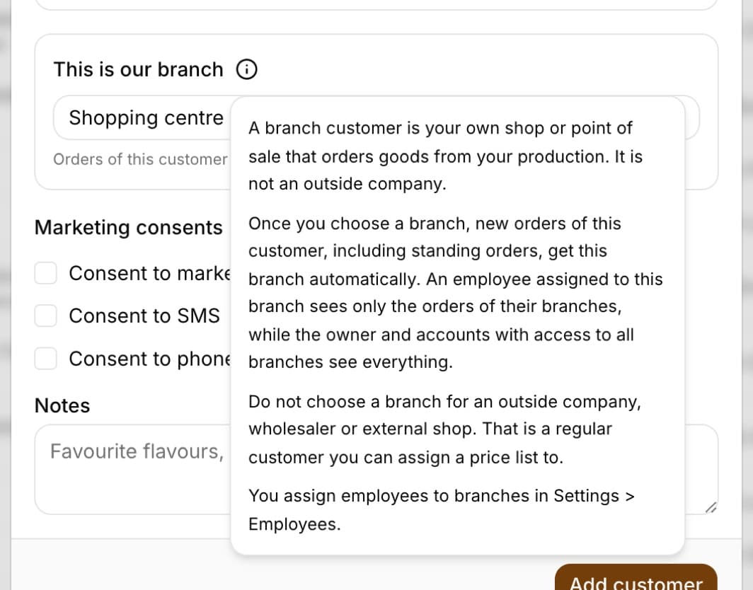 Customer window with the This is our branch field set to Galeria and the expanded hint: a branch customer is your own shop or point of sale that orders goods from your production; do not choose a branch for an outside company, wholesaler or external shop; you assign employees to branches in Settings > Employees